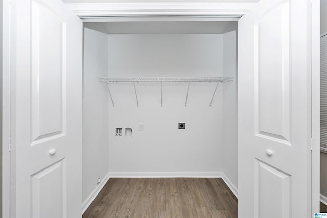 clothes washing area featuring wood-type flooring, hookup for an electric dryer, and hookup for a washing machine