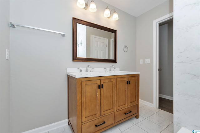 bathroom with tile patterned floors and vanity