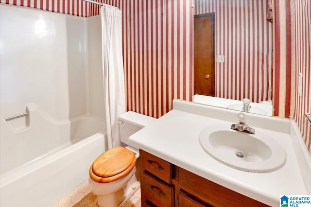 full bathroom featuring vanity, tile patterned floors, toilet, and shower / bathtub combination with curtain