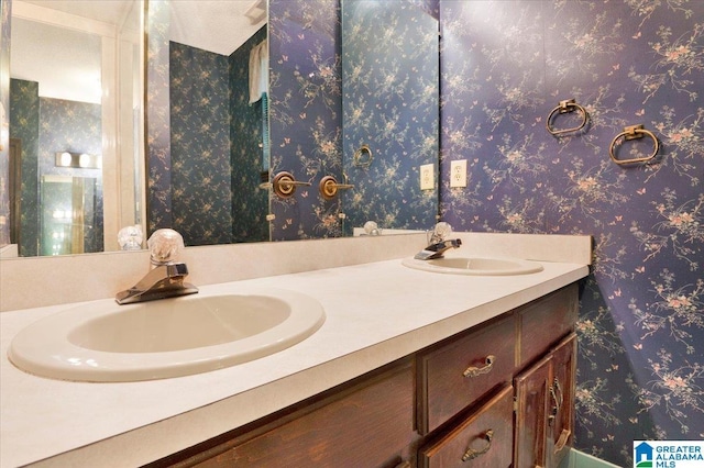 full bath with toilet, wallpapered walls, shower / bath combo, and vanity