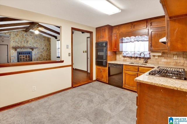 kitchen with tasteful backsplash, ceiling fan, vaulted ceiling with beams, black appliances, and sink