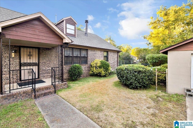 view of yard with a wooden deck and a fenced backyard