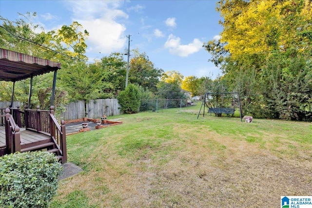 view of yard with a deck