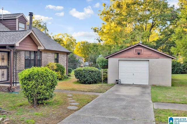 garage featuring a yard