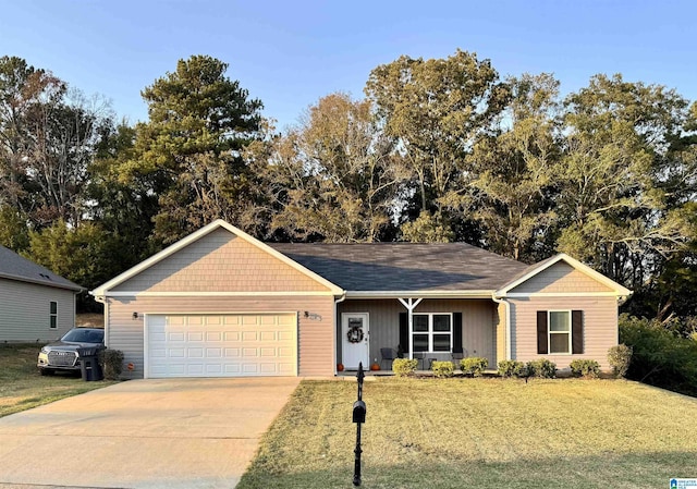 ranch-style home featuring an attached garage, driveway, and a front lawn