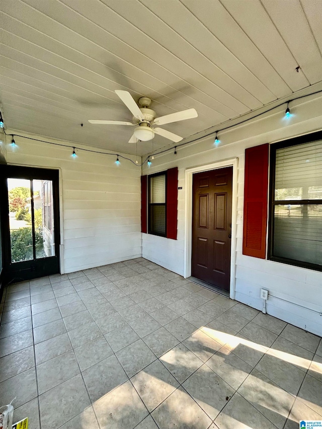 interior space featuring ceiling fan