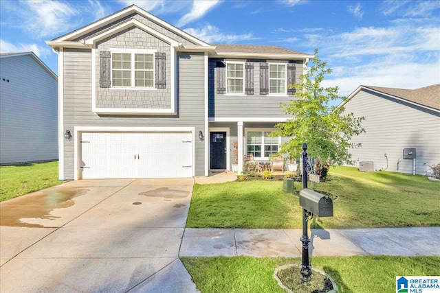 view of front of house with a garage, central AC, and a front yard