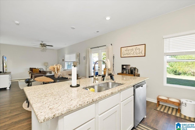 kitchen featuring white cabinetry, sink, a center island with sink, dark hardwood / wood-style floors, and dishwasher