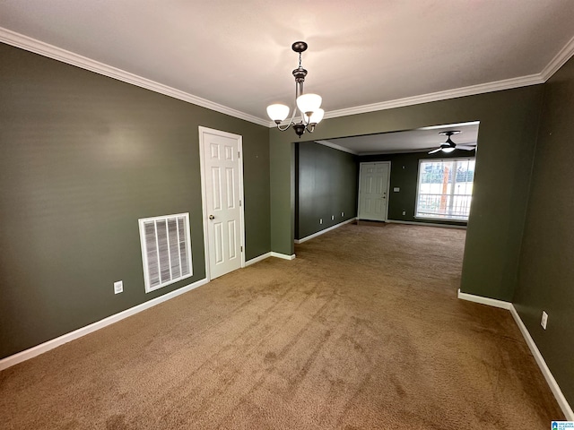 carpeted empty room featuring crown molding and ceiling fan with notable chandelier