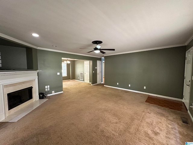 unfurnished living room featuring ornamental molding, carpet flooring, and ceiling fan