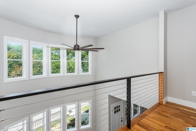 details with ceiling fan and hardwood / wood-style floors