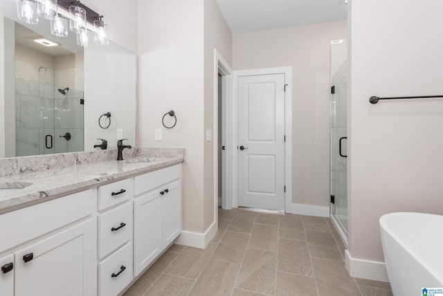 bathroom featuring independent shower and bath and vanity