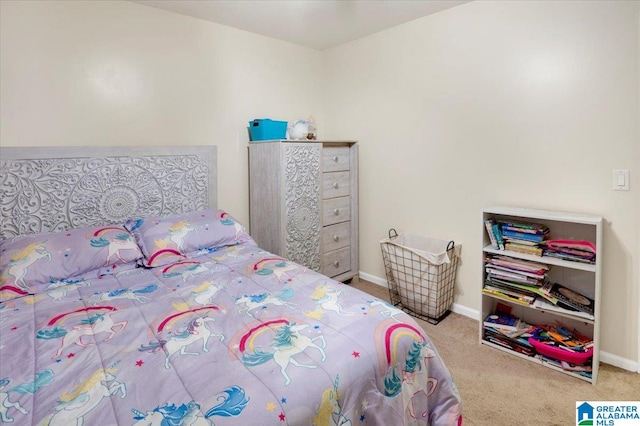 bedroom featuring light carpet