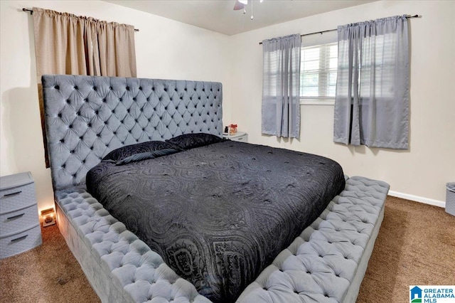 carpeted bedroom with ceiling fan