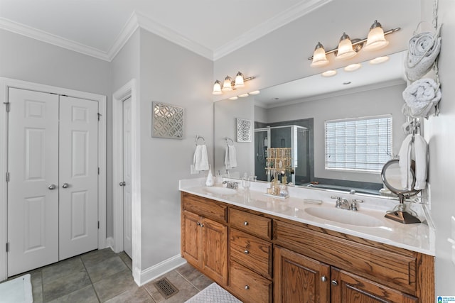 bathroom with vanity, tile patterned floors, ornamental molding, and an enclosed shower