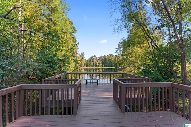 deck featuring a water view