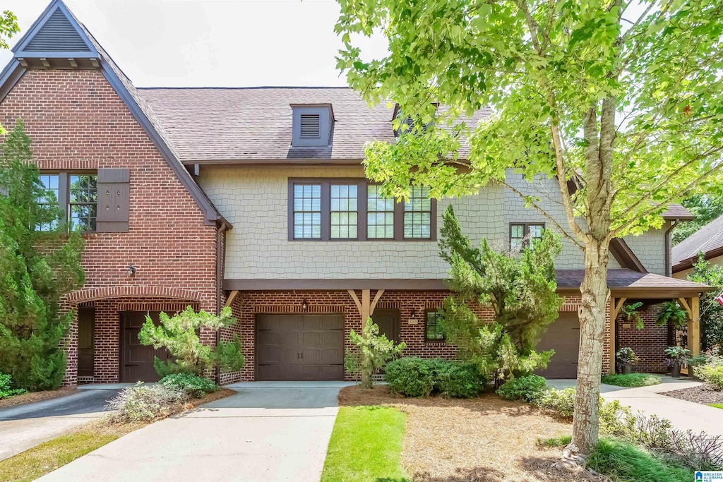 view of front of property with a garage