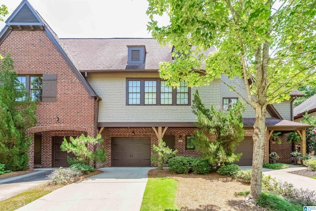 view of front of property with a garage