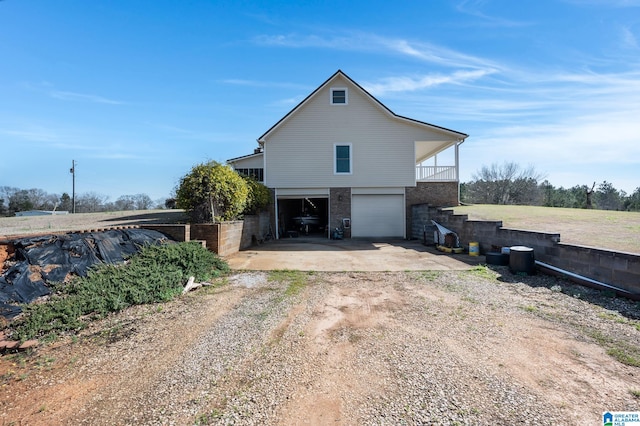 view of property exterior with a garage