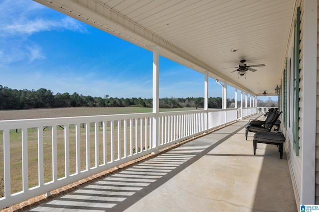 view of patio featuring ceiling fan