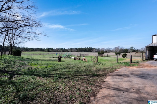 view of yard featuring a rural view