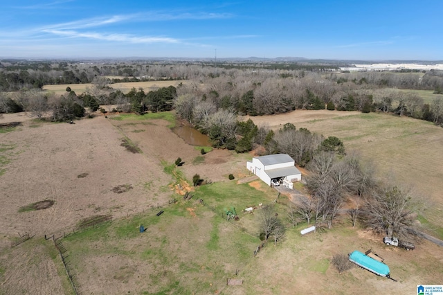 birds eye view of property featuring a rural view