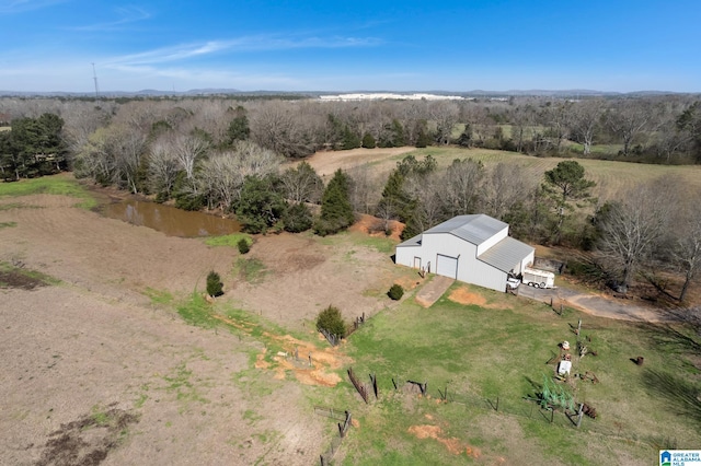 birds eye view of property featuring a rural view