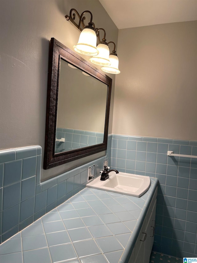 bathroom featuring tile patterned flooring, tile walls, and vanity