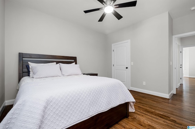 bedroom featuring ceiling fan and dark wood-type flooring