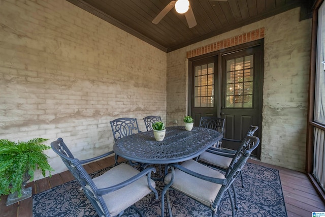 view of patio / terrace with a deck and ceiling fan