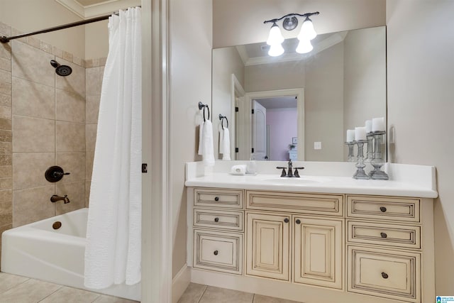 bathroom with ornamental molding, tile patterned flooring, shower / bath combo with shower curtain, and vanity