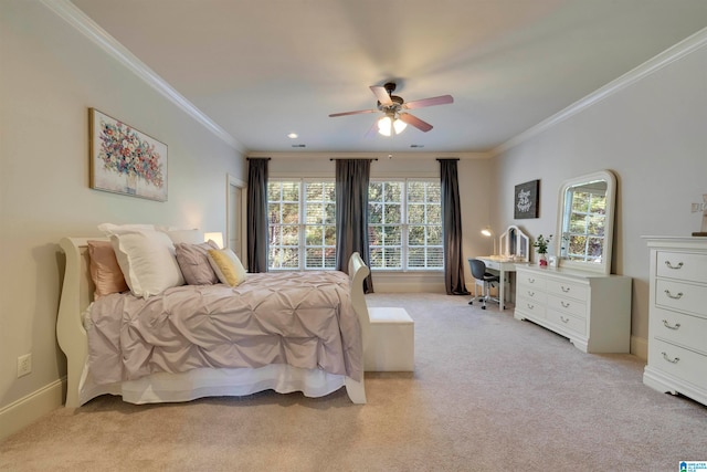 carpeted bedroom with ornamental molding, multiple windows, and ceiling fan