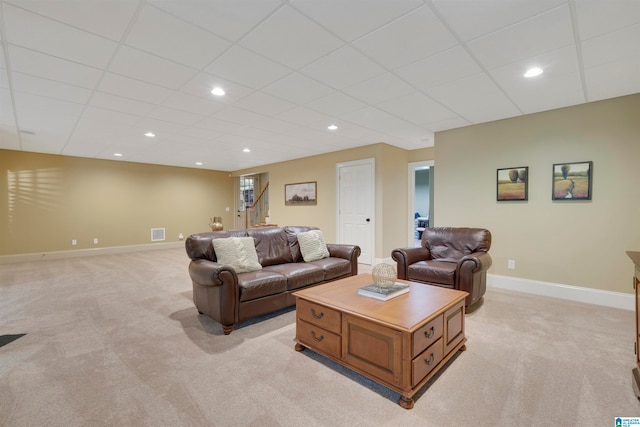 living room featuring light carpet