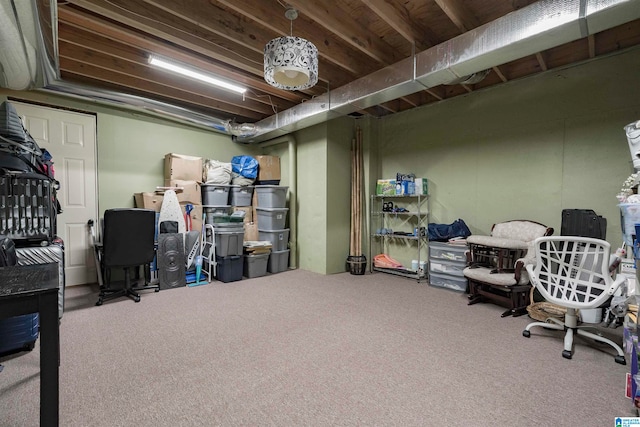 basement with carpet flooring