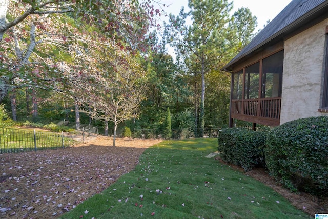 view of yard with a sunroom