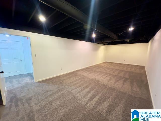 basement with carpet flooring