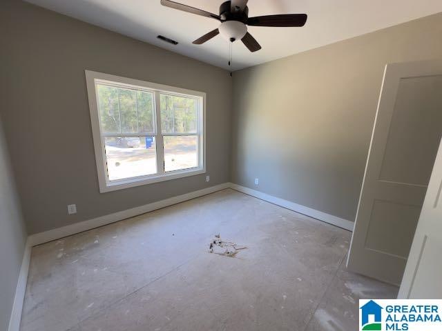 spare room featuring ceiling fan