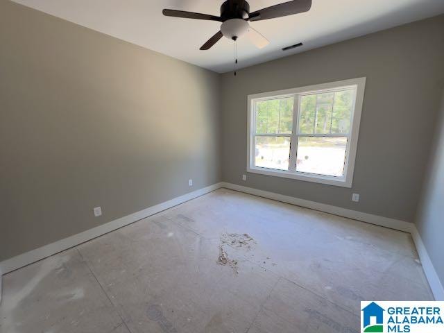 unfurnished room with ceiling fan