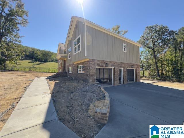 view of property exterior featuring a garage