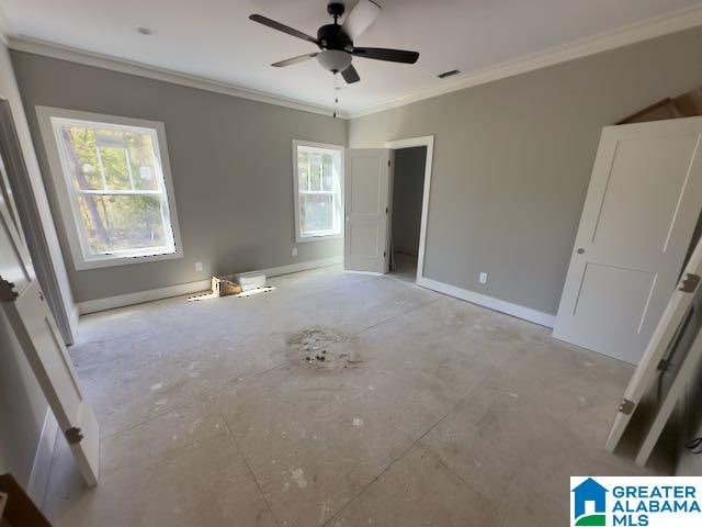 unfurnished bedroom with multiple windows, ornamental molding, and ceiling fan