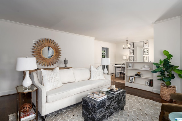 177 Ross Dr, Mountain Brook, AL 35213 - living area featuring wood finished floors, a chandelier, crown molding, and baseboards