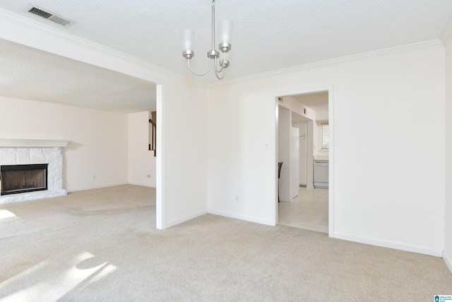181 Cambrian Way Unit 181, Birmingham, AL 35242 - unfurnished living room featuring ornamental molding, light colored carpet, a chandelier, a textured ceiling, and baseboards