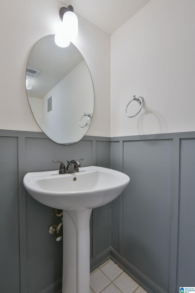 181 Cambrian Way Unit 181, Birmingham, AL 35242 - bathroom with a decorative wall, wainscoting, and tile patterned floors