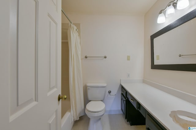 full bathroom with vanity, shower / bath combo with shower curtain, toilet, and tile patterned floors