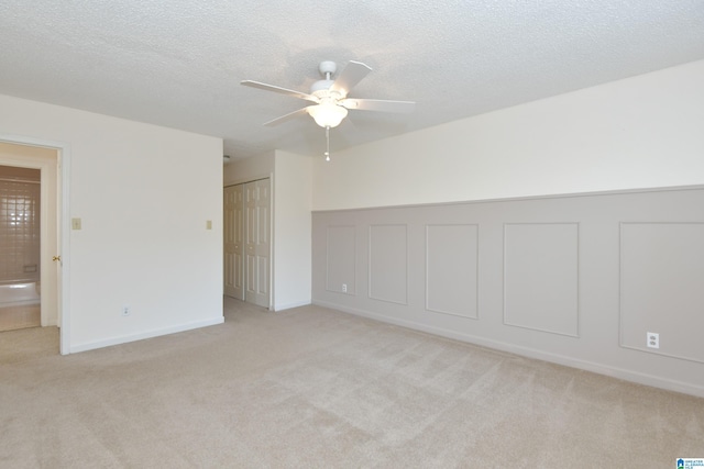 181 Cambrian Way Unit 181, Birmingham, AL 35242 - unfurnished room featuring a ceiling fan, light carpet, baseboards, and a textured ceiling