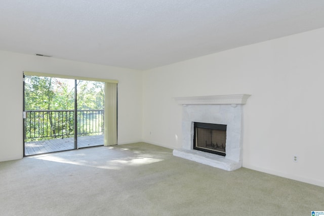 181 Cambrian Way Unit 181, Birmingham, AL 35242 - unfurnished living room featuring carpet flooring and a fireplace