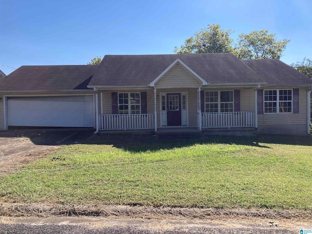 single story home with a garage, a front lawn, and a porch