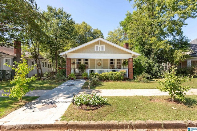 bungalow with a front yard