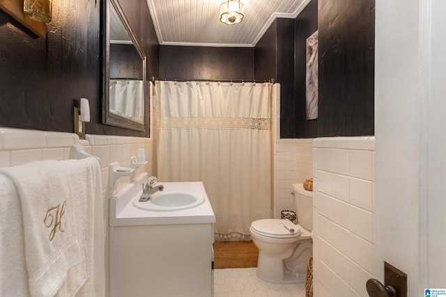 bathroom featuring vanity, tile patterned flooring, toilet, tile walls, and wood ceiling