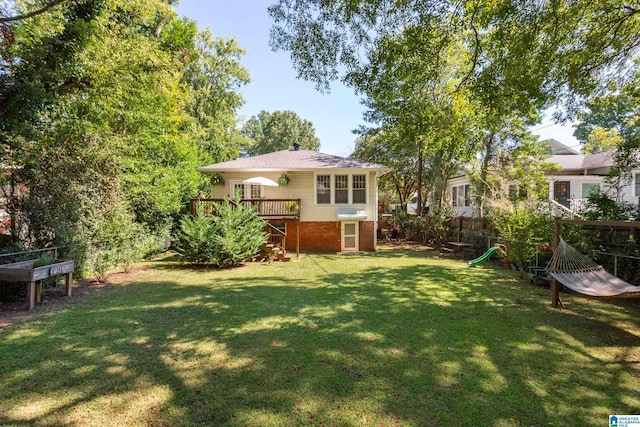 view of yard featuring a deck